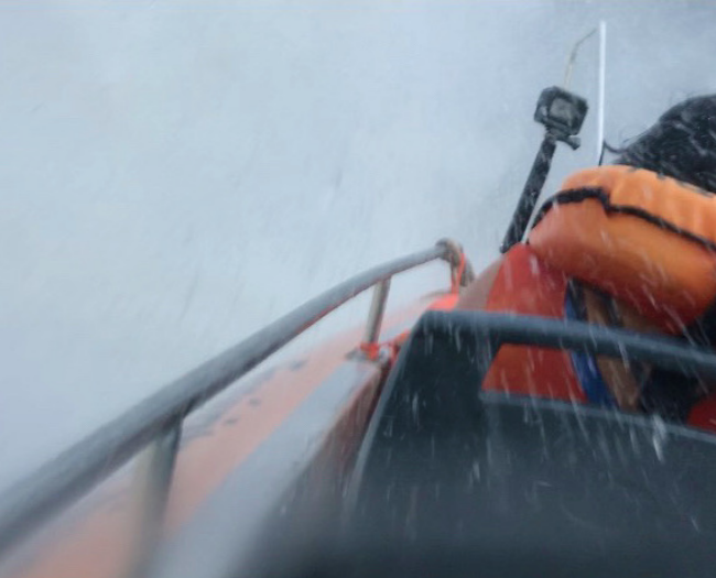 inside waterfall on boat tour