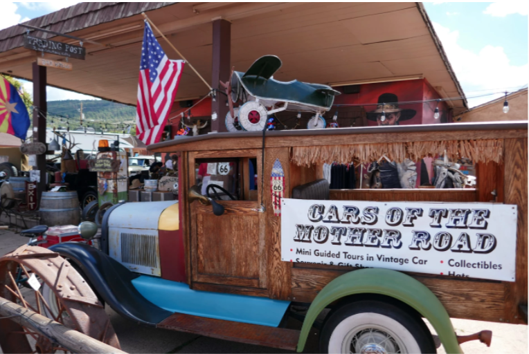 retro car and american flag at the route 66 museum