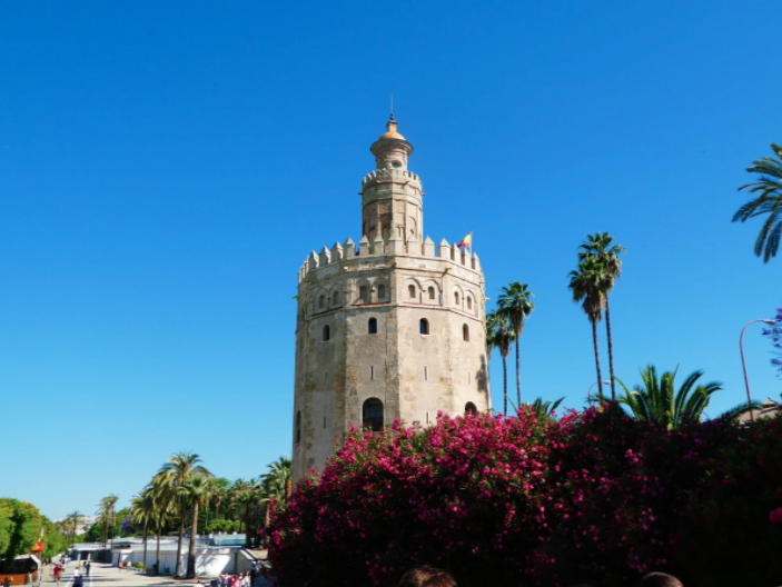 el torre del oro in spain, horse drawn carriage rides through seville