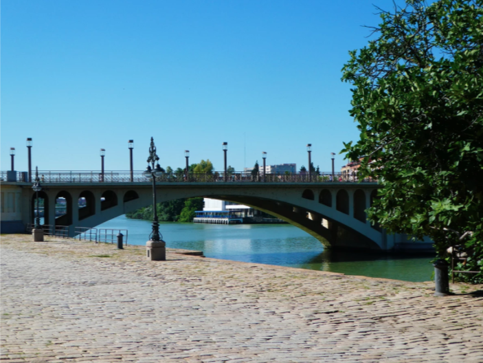 bridge over the river in seville is a beautiful thing to do