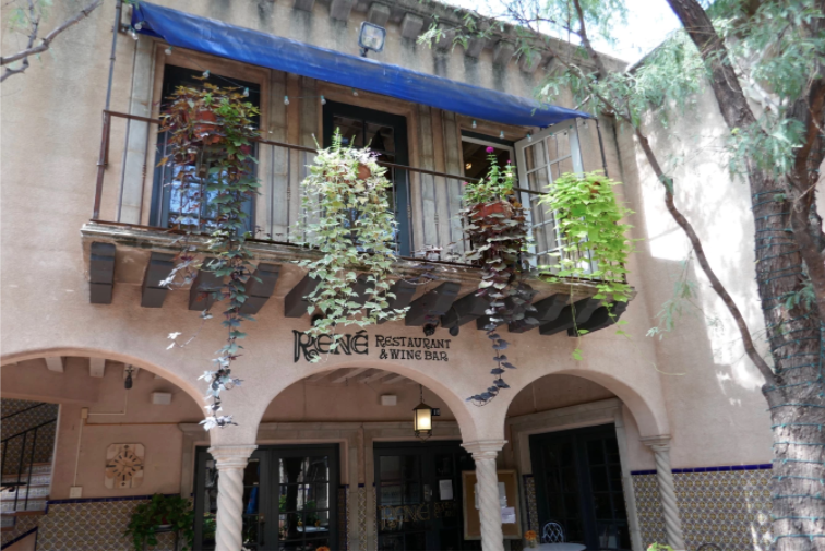 hanging plants and cafe entrance at tlaquepaque arts and shopping village