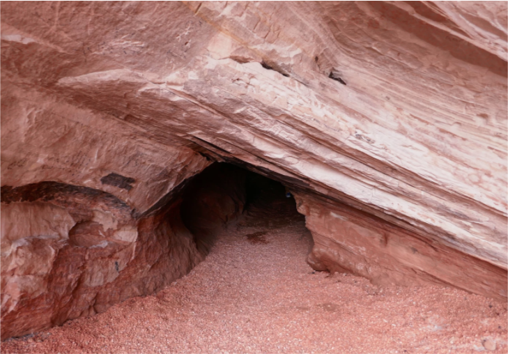 small cave in a red rock