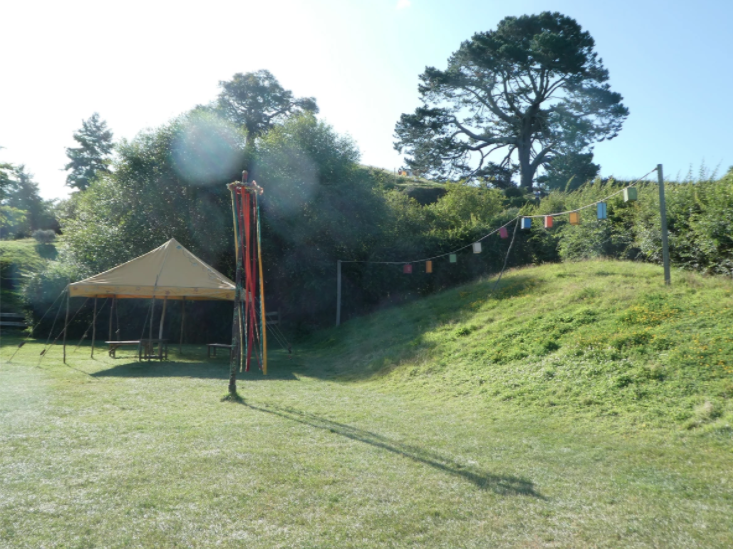party field in hobbiton on sunny day