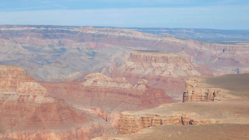 rock plateaus striped with natural red and white rock colors