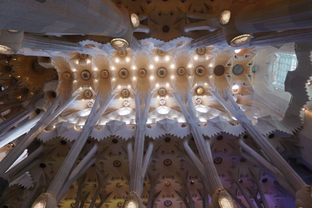 intricate columns and facades inside the sagrada familia