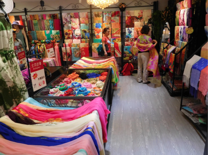 rows of silk in street store