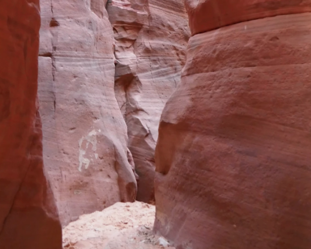 narrow red rocks in red hollow slot canyon