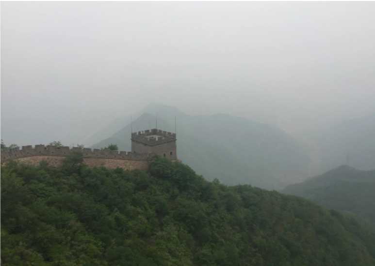 clouds rolling over the great wall of china