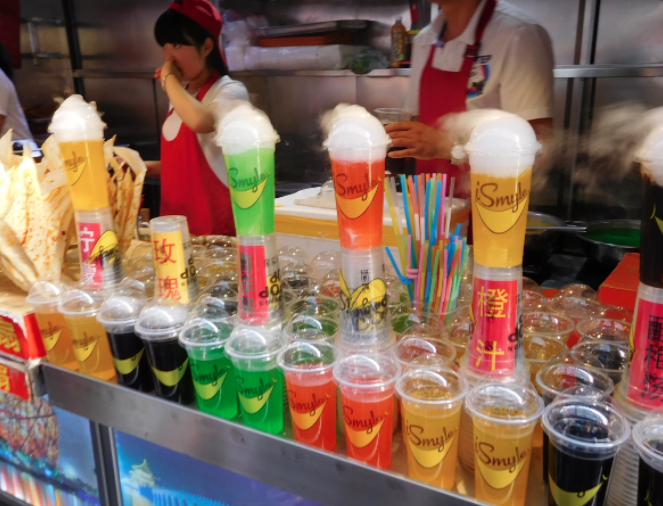 cloudy white gas coming out of brightly colored drinks