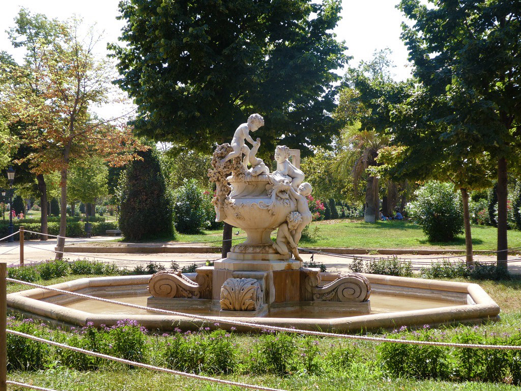 stone statue of ciutadella park on a sunny day
