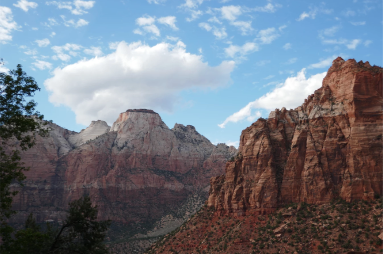 rock formations from far away with clouds