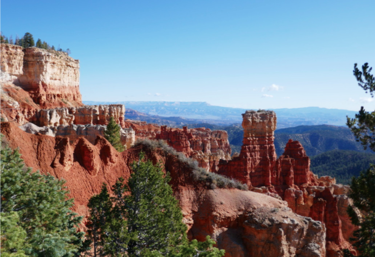 deep red rock tower hoodoos on a clear blue day