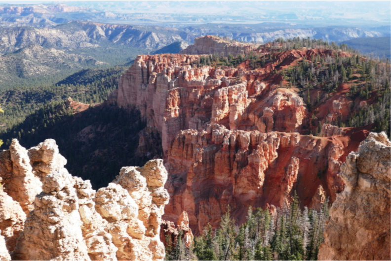 beautiful red rock hoodoos created by erosion on a sunny day