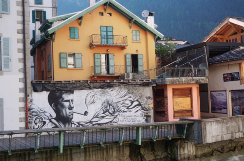 street art in chamonix of a man smoking a pipe