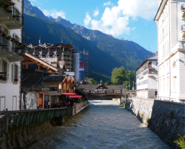 wooden bridge in chamonix from a distance