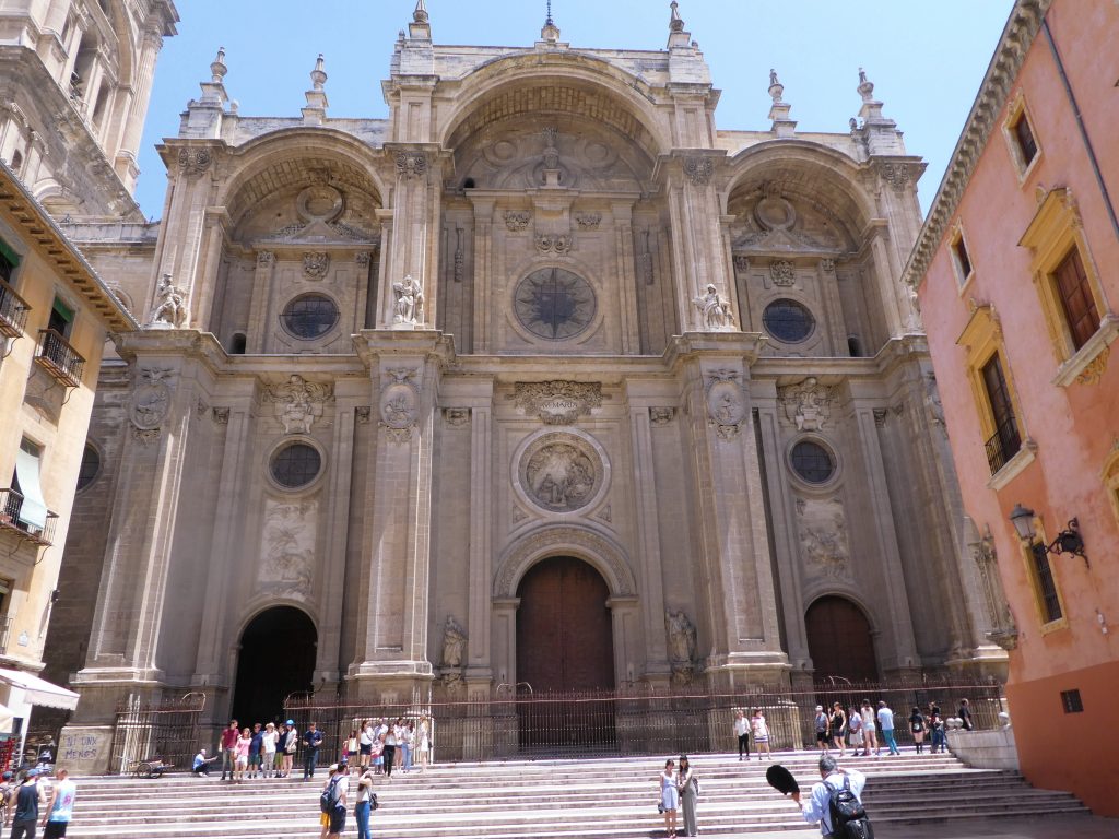 the cathedral of granada grand entrance with three columns