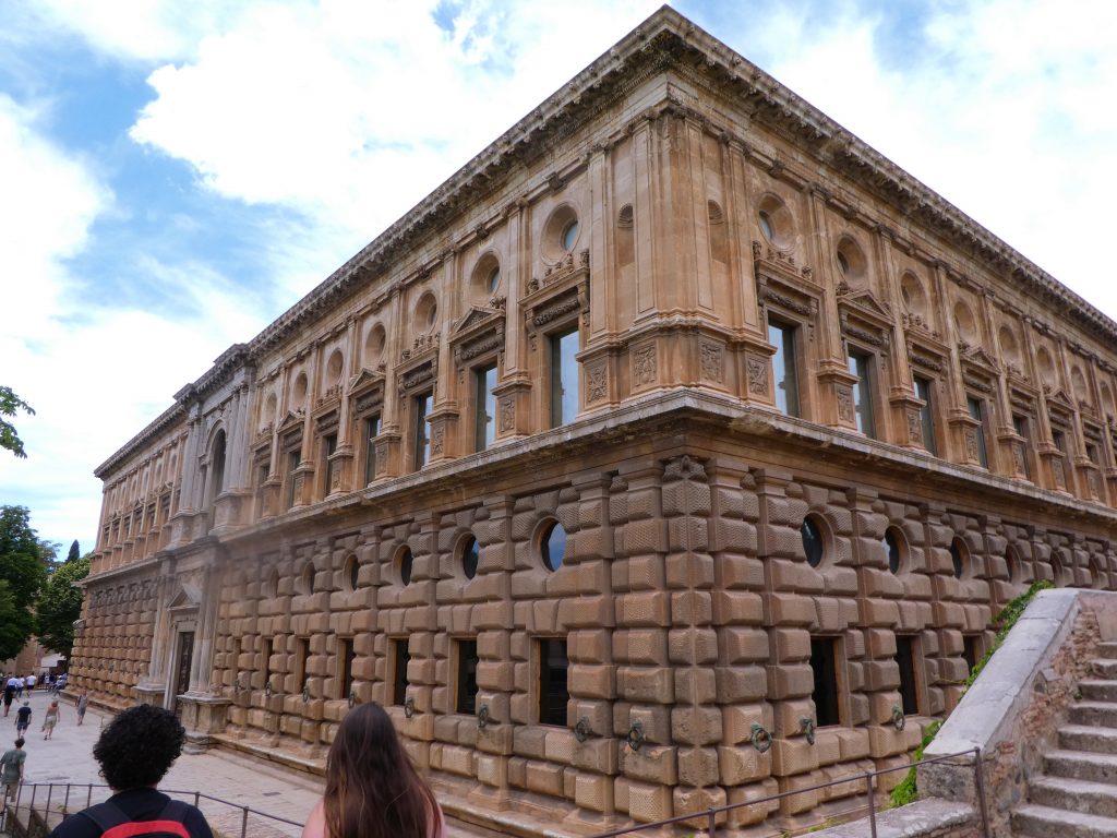 grid like stone wall in red building with second layer columns
