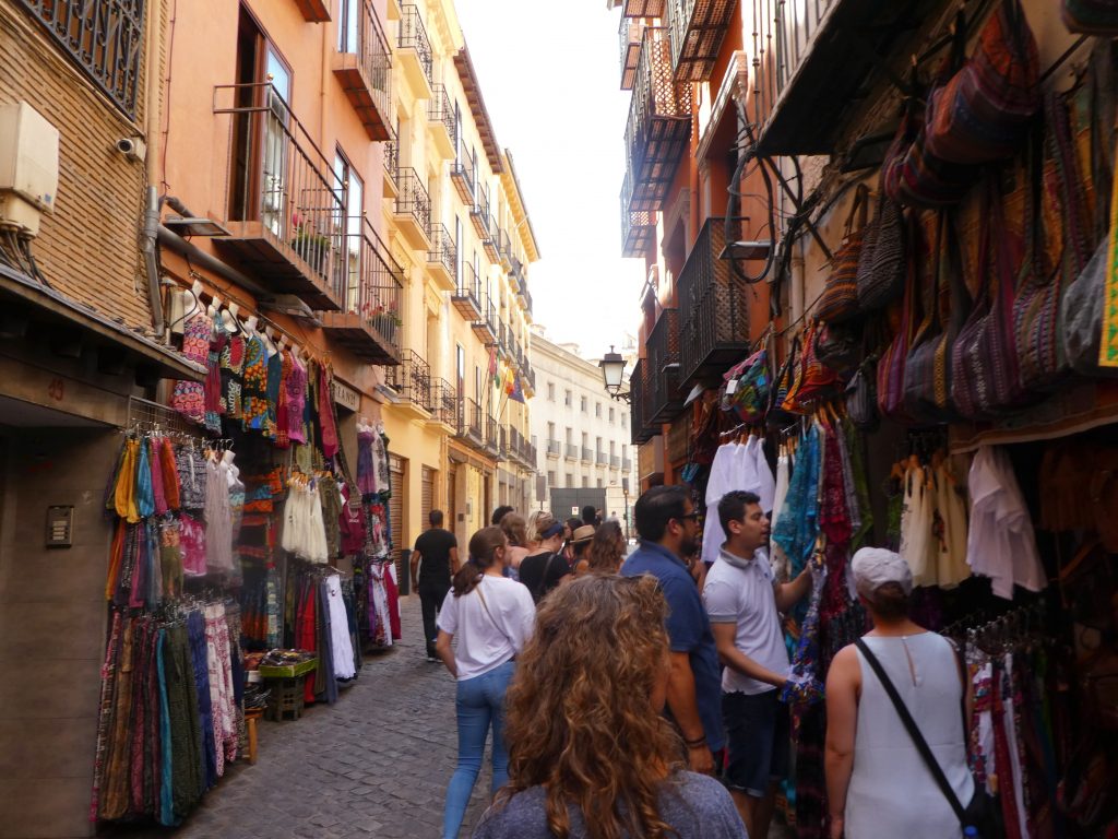 street shopping in granada with people walking