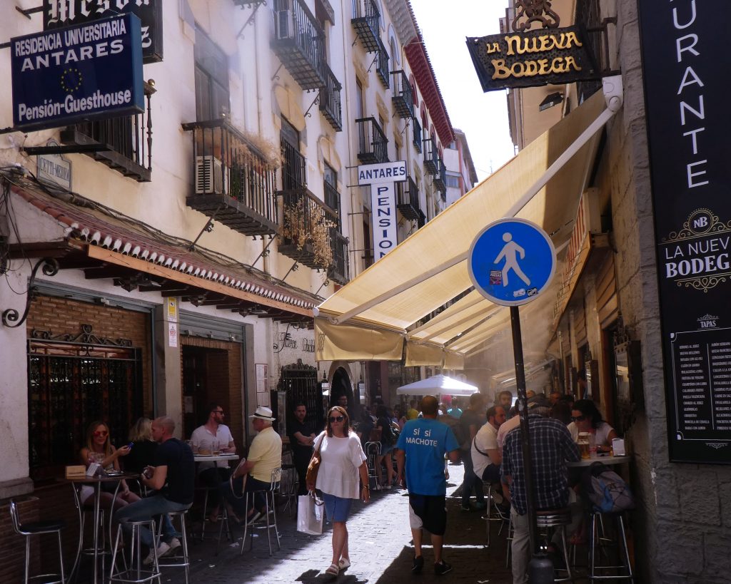 fabric overhangs on a walking street