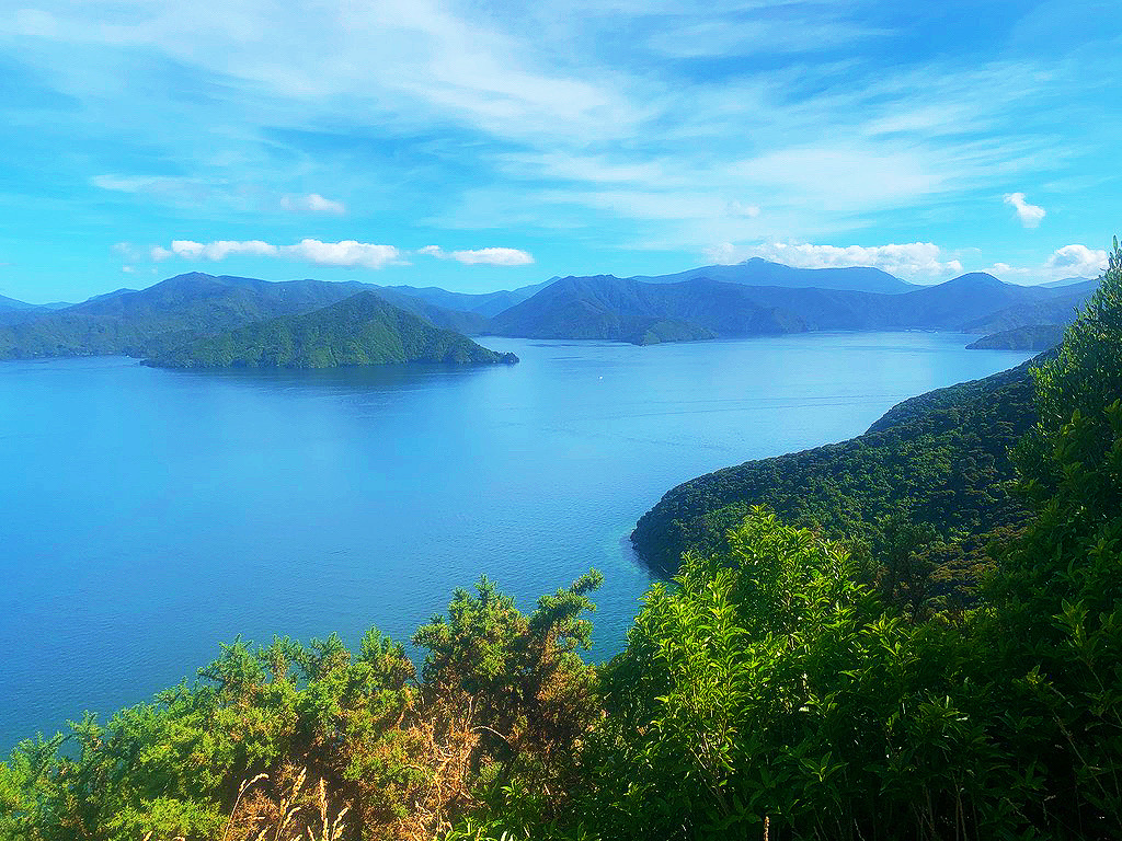 light blue water with clouds