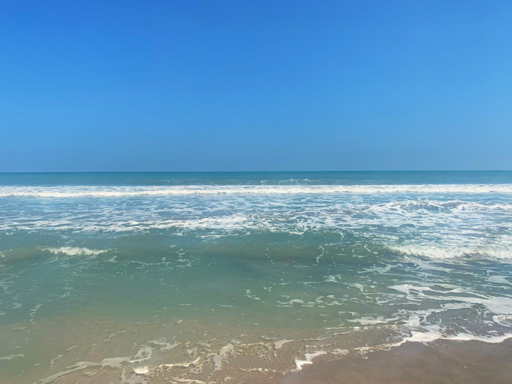 blue ocean with white waves