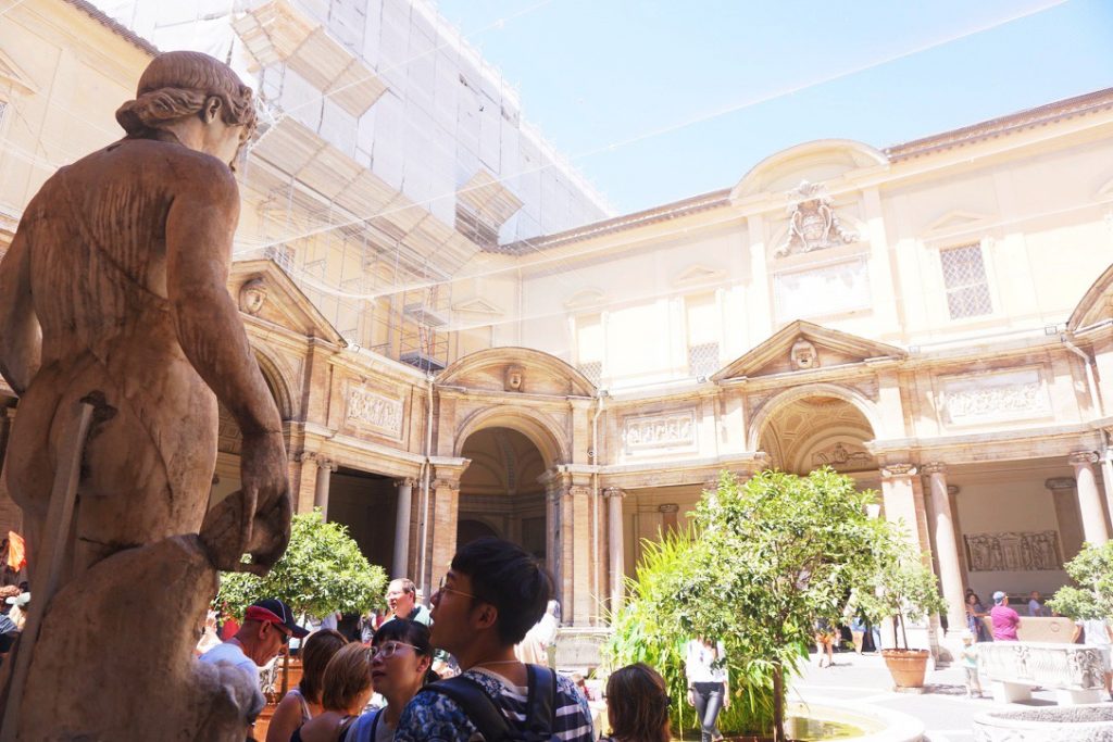 architecture of vatican with people in front