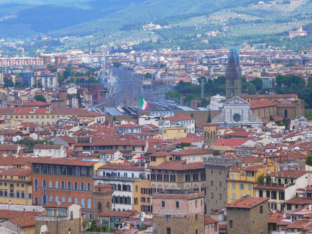 dense city buildings with red roofs in downtown florence