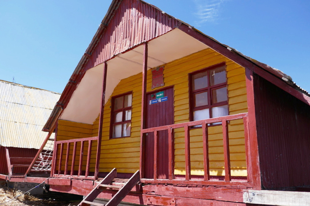 yellow and red primary school room on lake titicaca floating islands
