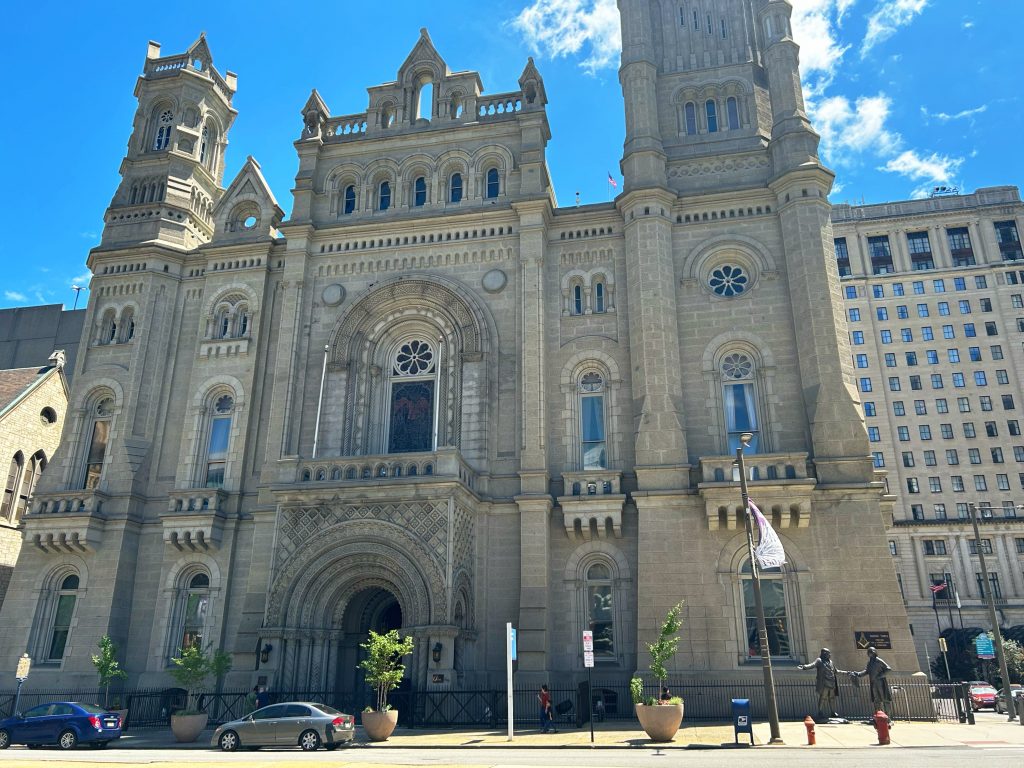 giant door of the philadelphia masonic temple with blue sky in the background