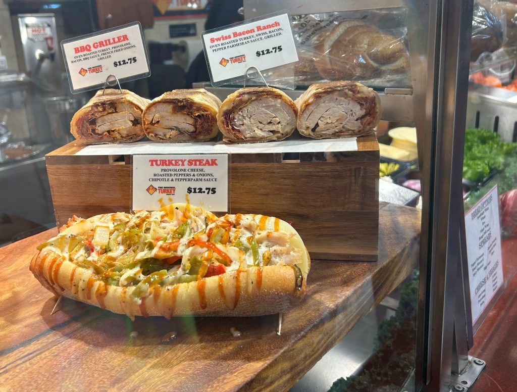 turkey cheesesteak in display case of reading terminal market