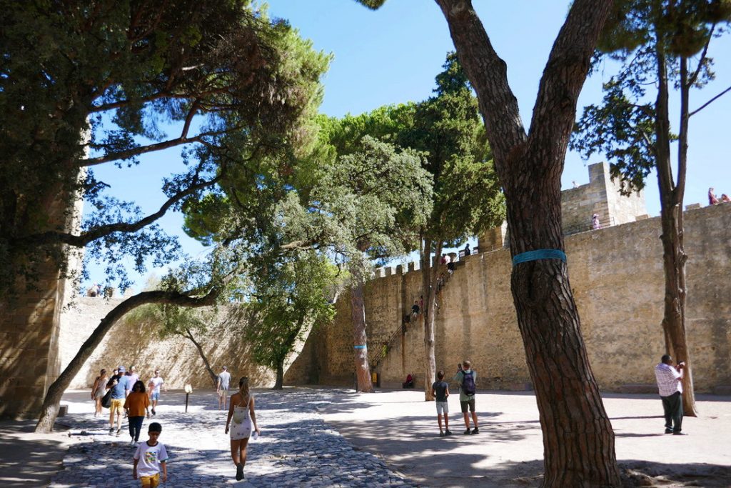 open stone clearing at the entrance of san jorge castle in lisbon