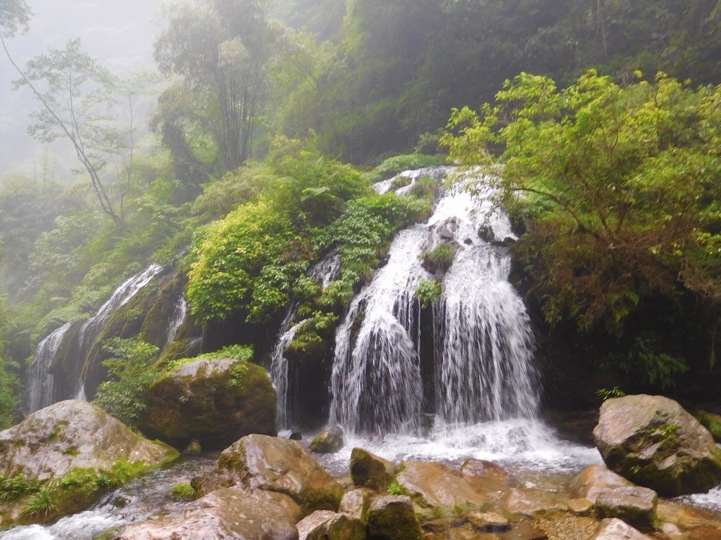 waterfall at the three gorges tribe scenic spot
