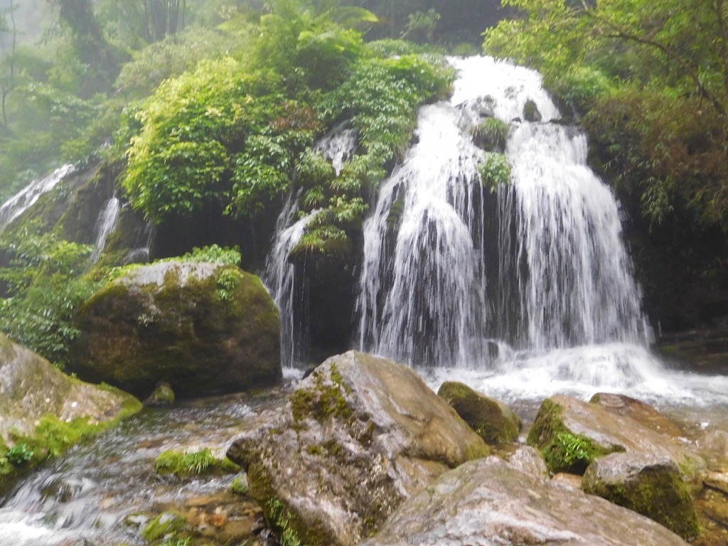 waterfall at three gorges tribe scenic spot