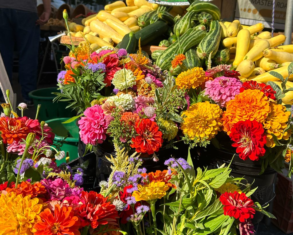 flowers and vegetables for sale at dupont circle farmer's market