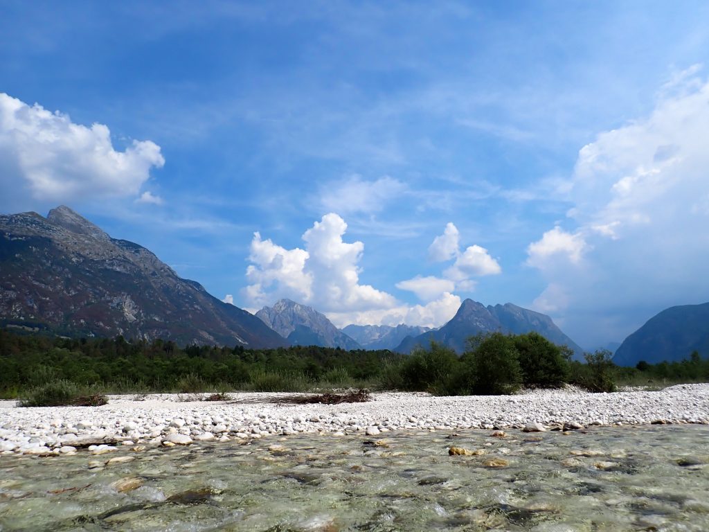 view of mountains in the soca valley taken from the river