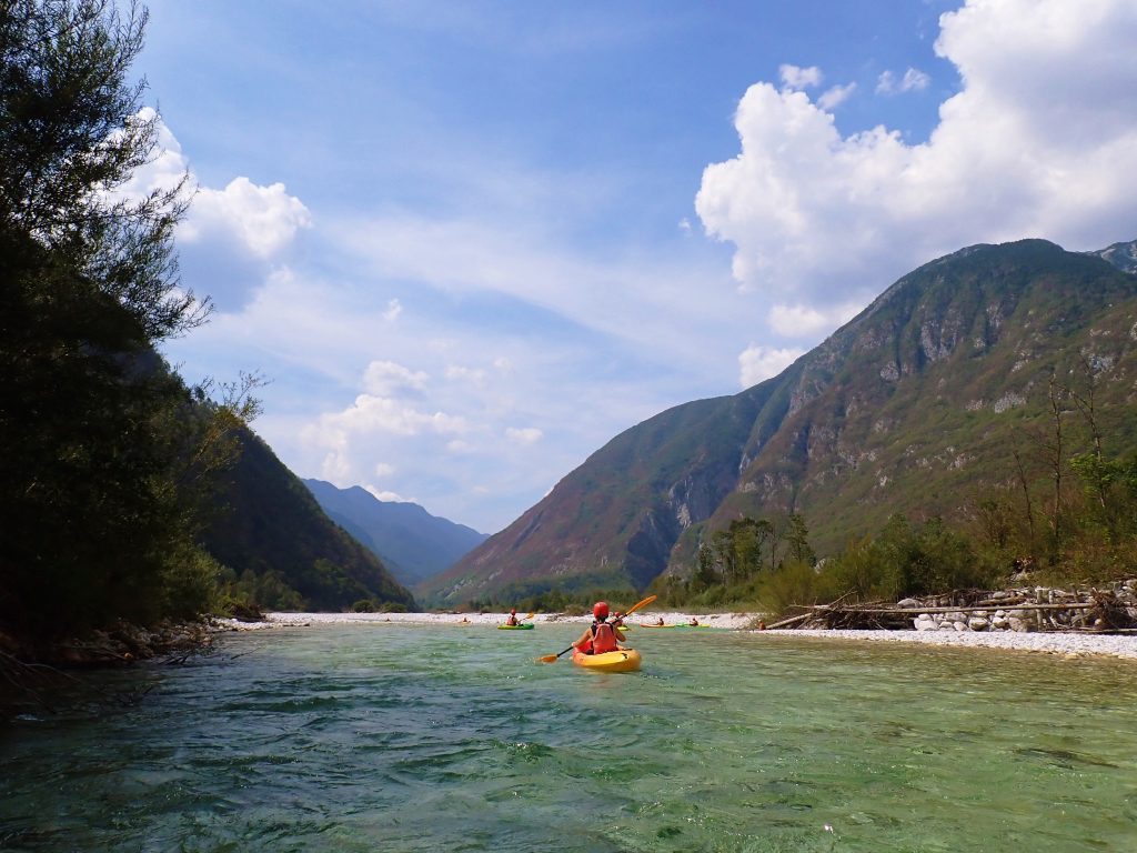 image of kayaker in the soca valley near bovec