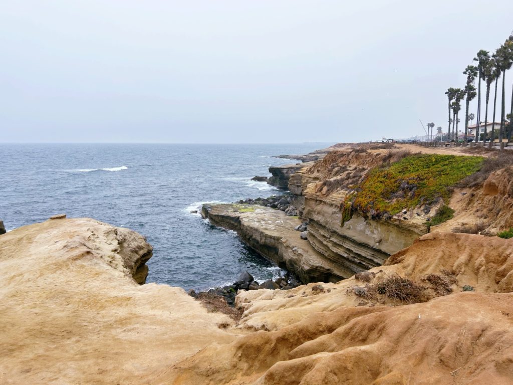 rocks of sunset cliffs in san diego on overcast day