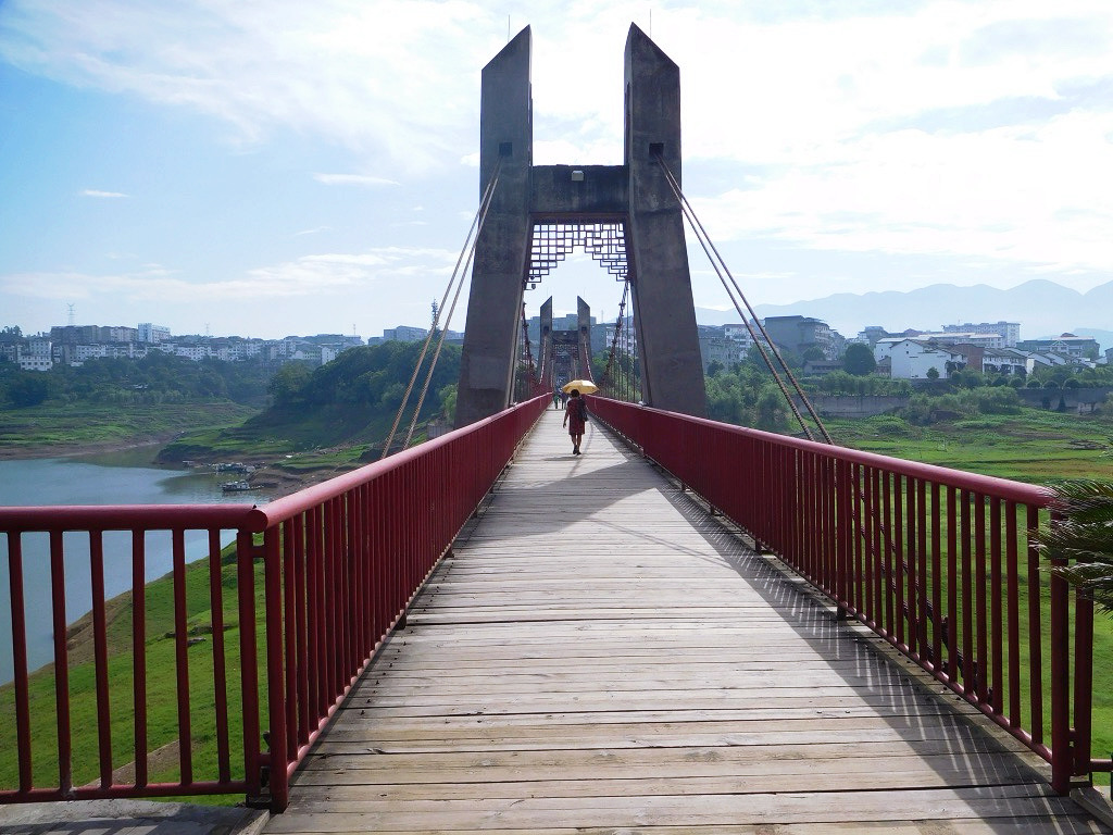 hanging wooden bridge to get to the red pagoda china