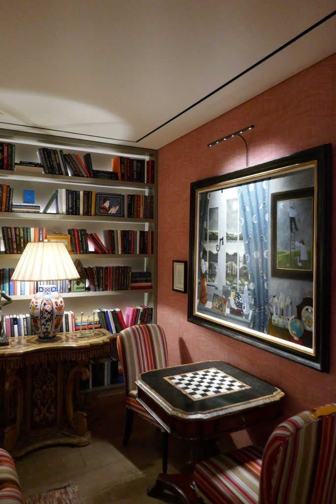 cozy corner with book shelf and chess table