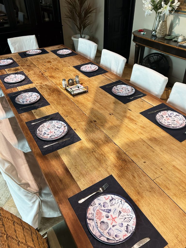 wooden table with beach themed plates
